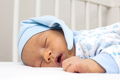 baby sleeping with mouth open