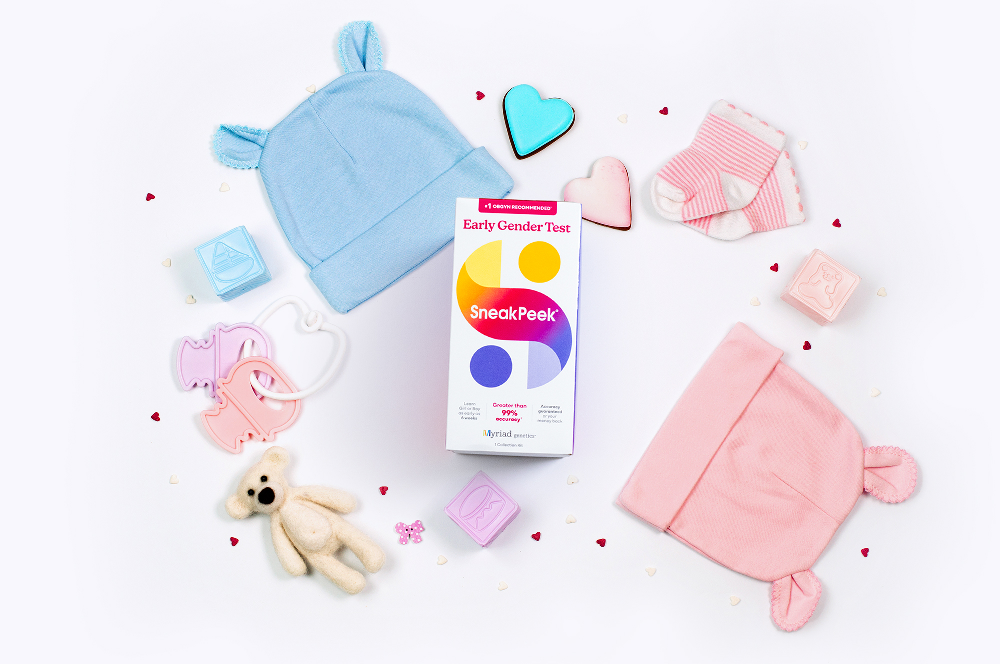 Baby shower party background with baby accessories on white background with blank space for text; top view, flat lay